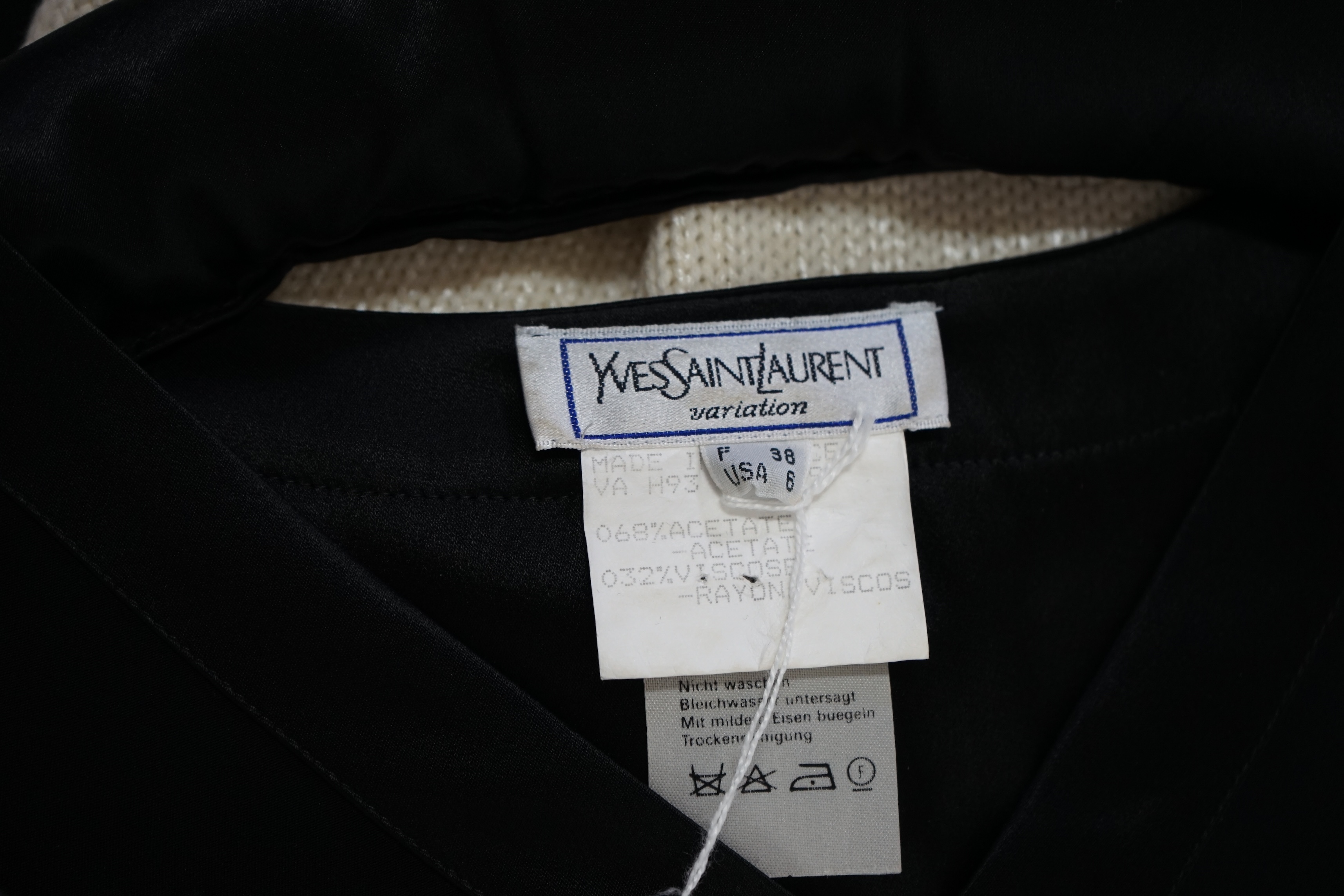 Four vintage Yves Saint Laurent variation lady's tops, F 40 (UK 12).Proceeds to Happy Paws Puppy Rescue